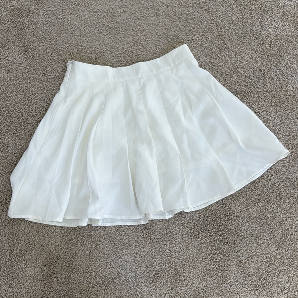 White pleated skirt
